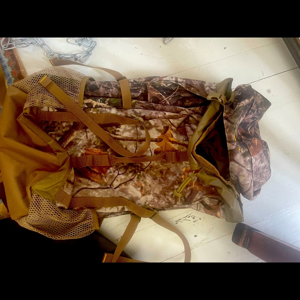Brand new camouflage Cabela’s backpack.
